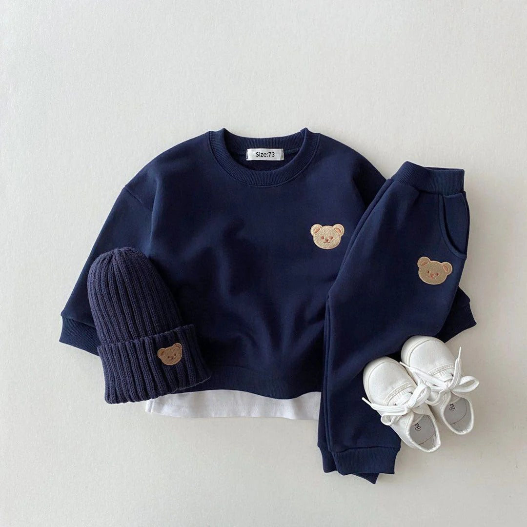 Baby's jogging outfit: sweatshirt, pants, and hat