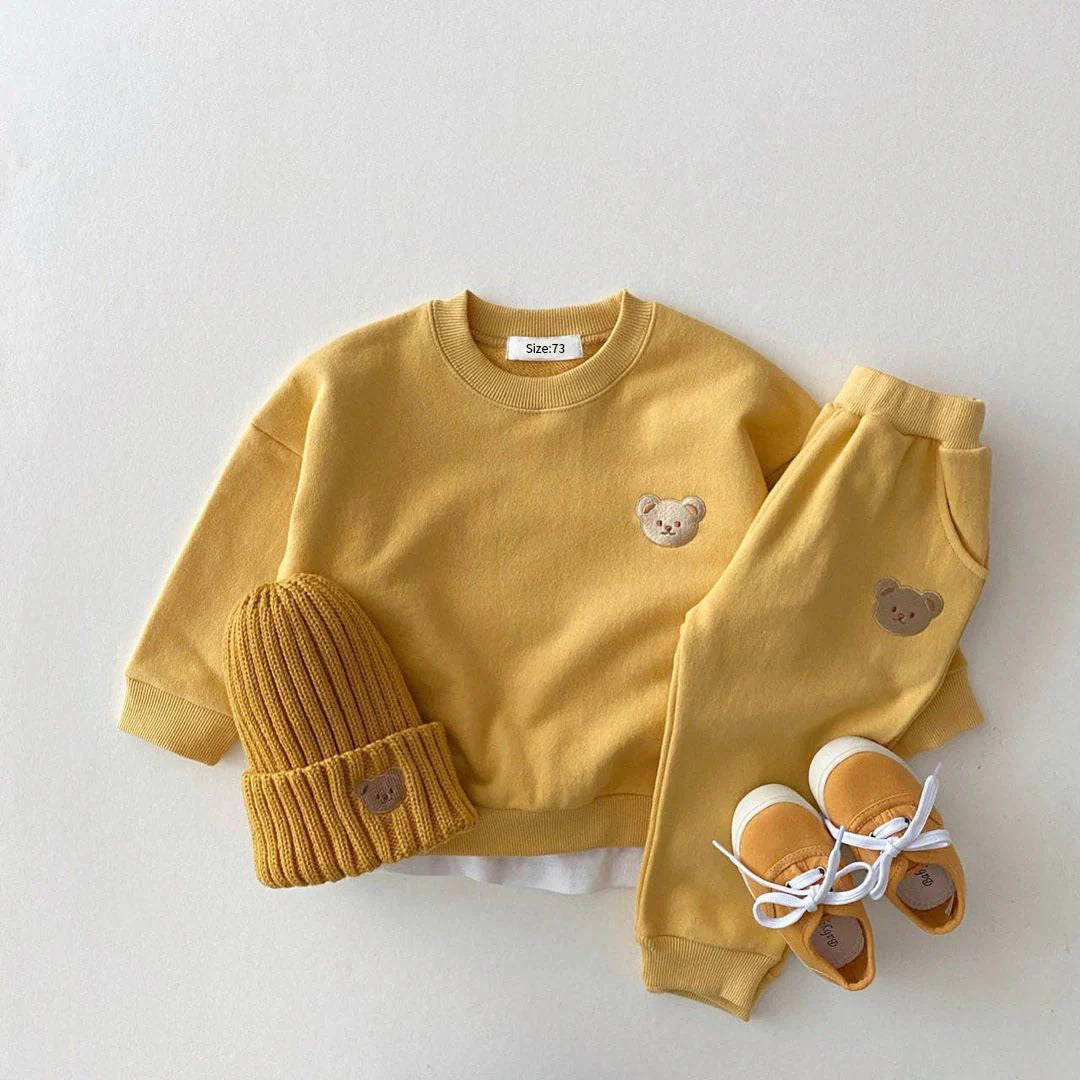 Baby's jogging outfit: sweatshirt, pants, and hat
