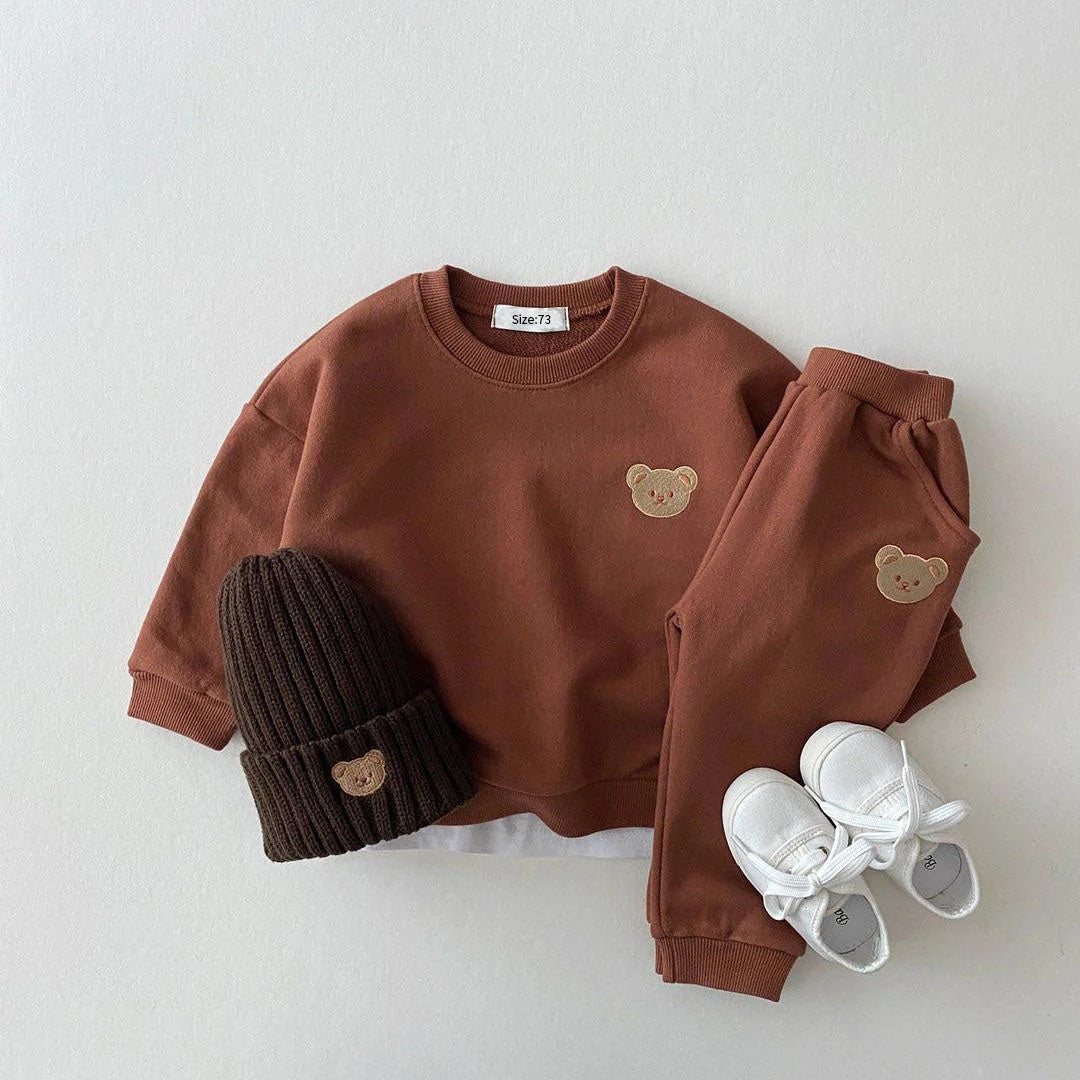 Baby's jogging outfit: sweatshirt, pants, and hat